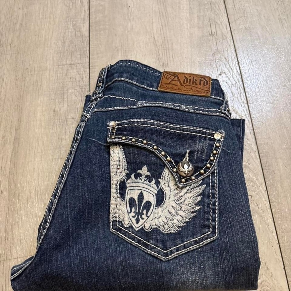Adikid blue bootcut jeans with‎ white stitching and embellishments Woman size 6